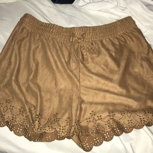 Khaki shorts with cutouts